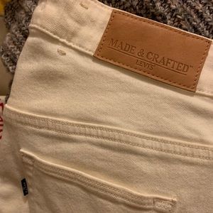 Levi’s mid-rise skinny jeans in cream (never worn)